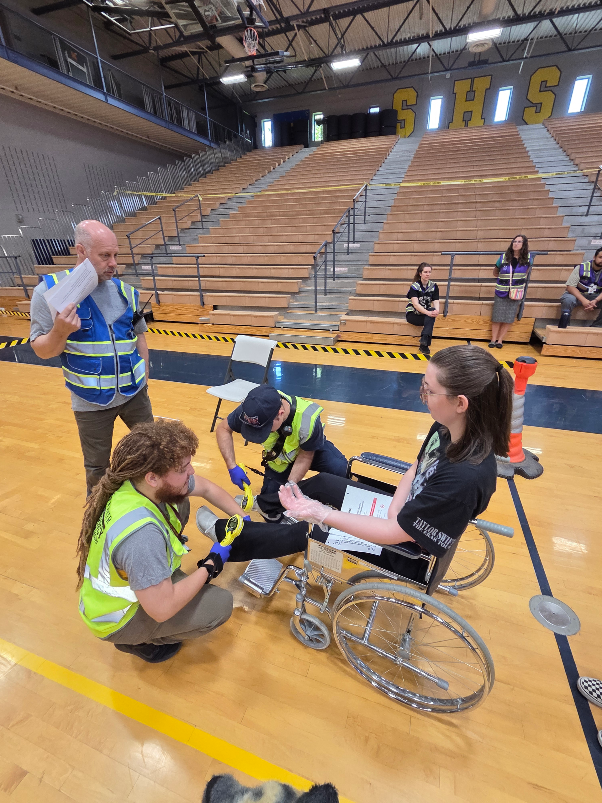 Exercise evacuee being checked for radiation contamination